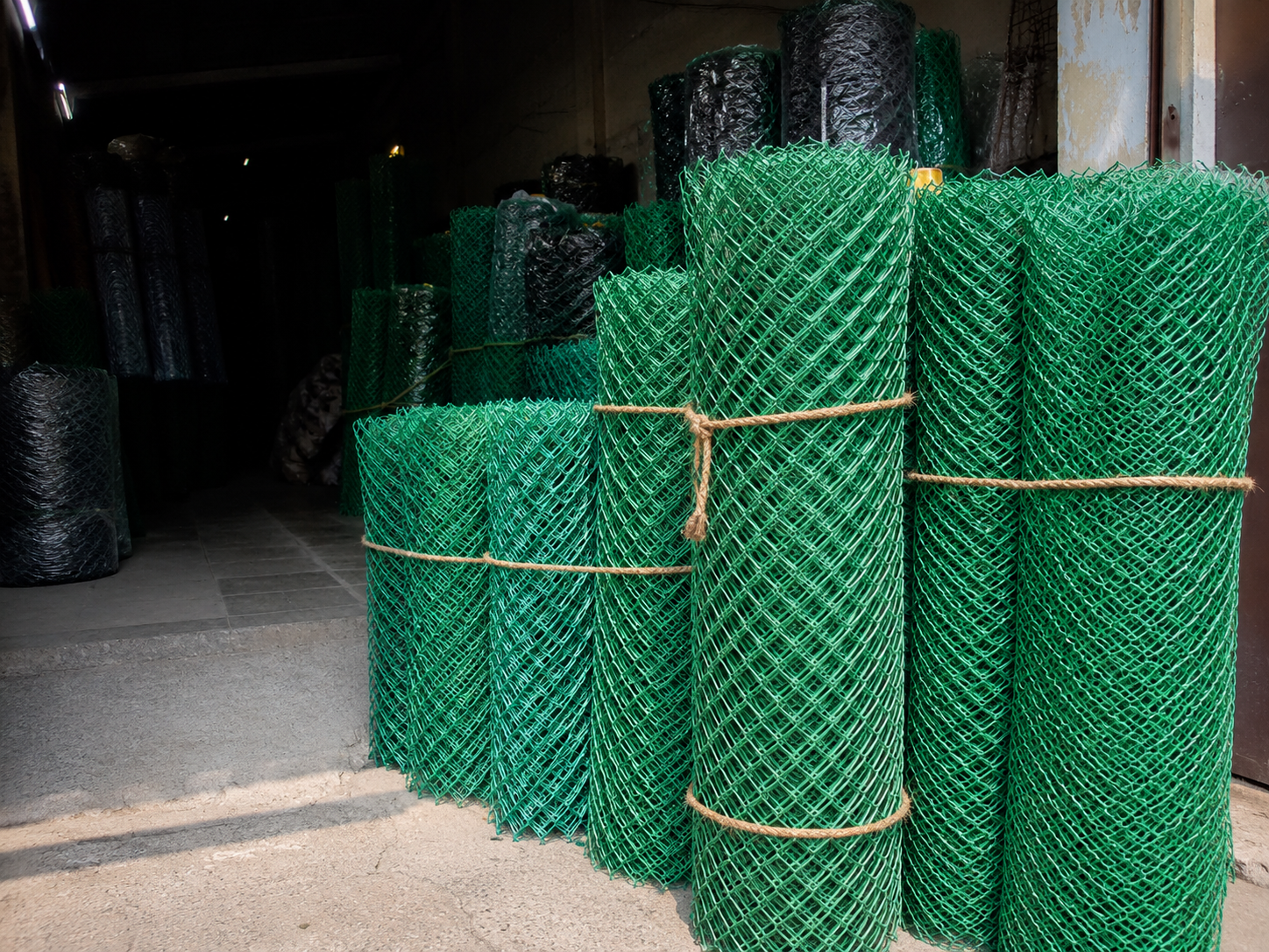 Green chain link mesh rolls